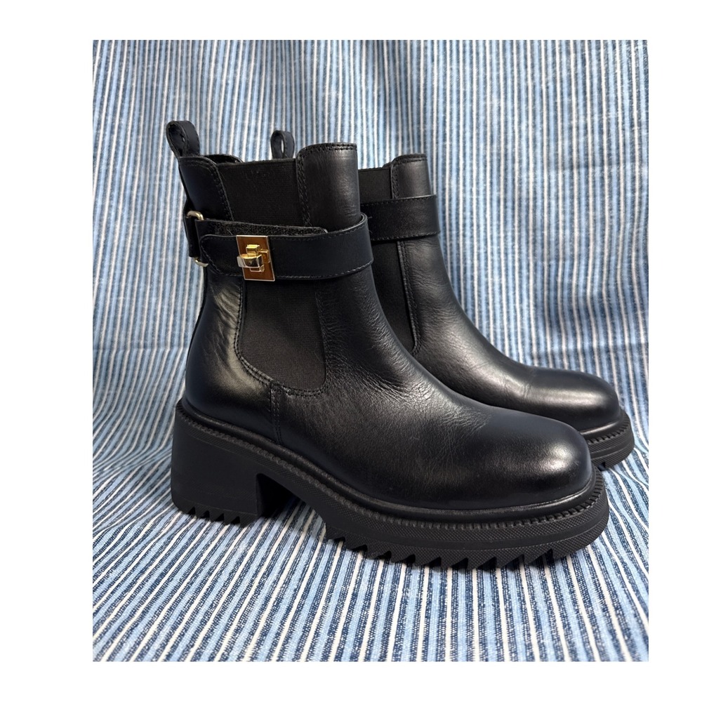 Steve Madden Black Leather Ankle Boots with Gold Accent